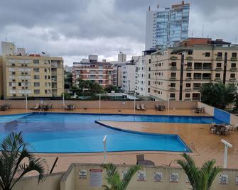 Condomínio Golden Sun - Apartamentos por temporada - Guaruja - Pool