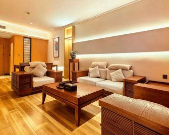 Lianyungang Dong Yuan International Hotel - Lianyungang - Soveværelse