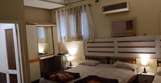 Samrat Hotel - Ludhiana - Schlafzimmer