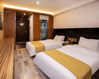 Candy Durian Hotel Select (Nanjing Jiangpu Passenger Station) - Nanjing - Soveværelse