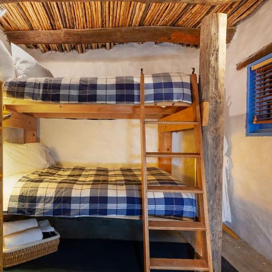 Bedroom view of Big Bend Bunkroom - affordable right outside Big Bend Nat'l Park.
