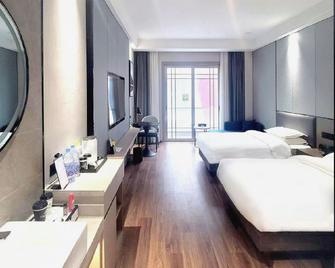 Windsor King Hotel - Rizhao - Ložnice