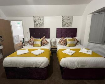 4 Sisters Inn - Lincoln - Bedroom