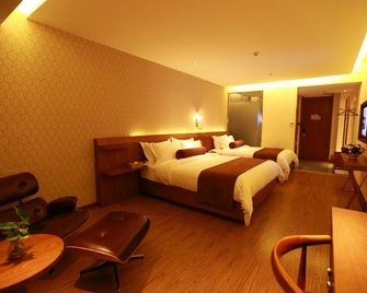 James Joyce Hotel Qinhuangdao Railway Station - Qinhuangdao - Bedroom