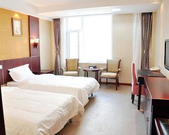 Weihai Huayu Business Hotel - Weihai - Bedroom