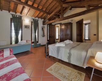 \'Fienile\' loft in farmhouse, swim pool, pvt terrace with stunning view - Loro Ciuffenna - Bedroom