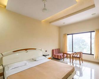Hotel Sejal Inn - Saputara - Bedroom