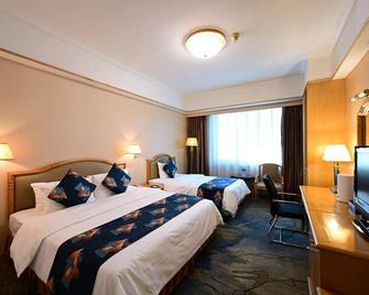 Hna Redbuds Hotel - Changchun - Quarto