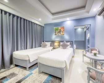 Phu Quoc Ocean Pearl Hotel - Phu Quoc - Schlafzimmer