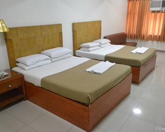 Cebuview Tourist Inn - Cebu City - Schlafzimmer