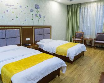Emeishan Hongzhao Hotel - Leshan - Bedroom