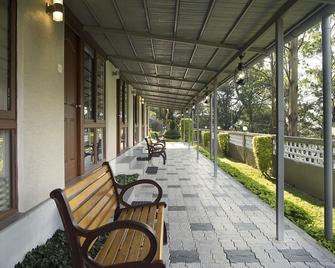 Abad Copper Castle Resort - Munnar - Patio