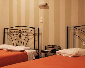 Athinaikon Hotel - אתונה - חדר שינה