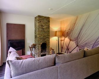 Two person luxury apartment close to nature. - Vaassen - Huiskamer