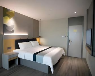 Home Inn Neo Jiujiang Railway Station - Jiujiang - Bedroom