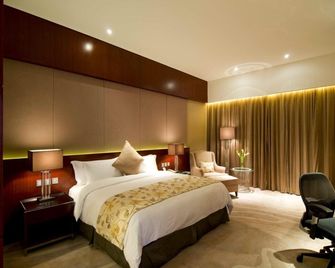 Quanzhou Jinjiang Hollyston Hotel - Quanzhou - Bedroom