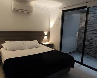 Amplios Apartamentos San Fernando Cerca a Centros Médicos - Cali - Bedroom