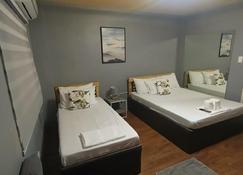 Djci Apartelle with kitchen n bath 211-209 - Cabanatuan City - Bedroom