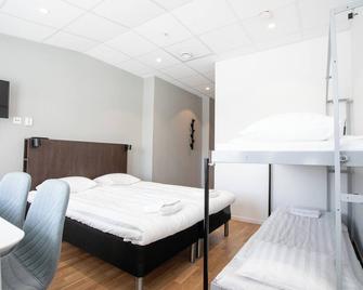 Apartdirect Arlandastad - Rosersberg - Habitació