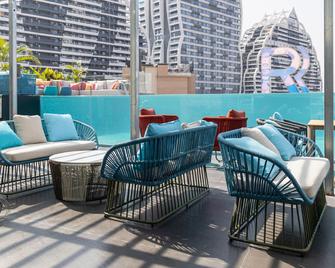 Xishuangbanna Rongye Hotel - Xishuangbanna - Balcony