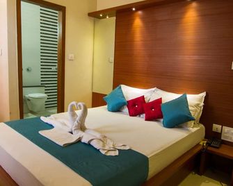 The Grand Inn Mysore - מיסור - חדר שינה