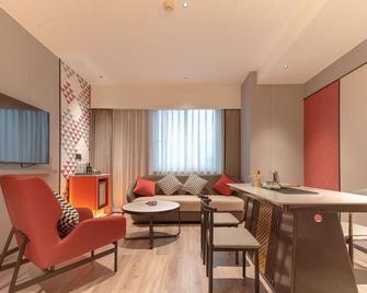 Borrman Hotel (Wuzhou Qiloucheng) - Wuzhou - Huiskamer