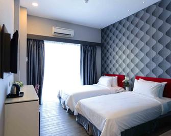 Cenang Plaza Beach Hotel - Пантай Ченанг - Спальня