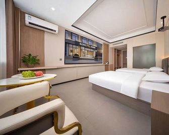 International Trade Hotel - Shangrao - Bedroom