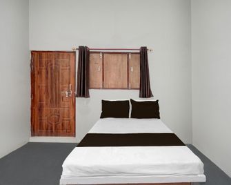 Spot On by OYO Rs Hotel - Sītāpur - Bedroom