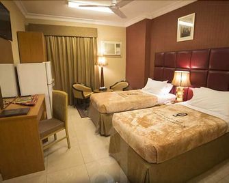 Zomorodet Al Aseel Hotel - Mecca - Bedroom