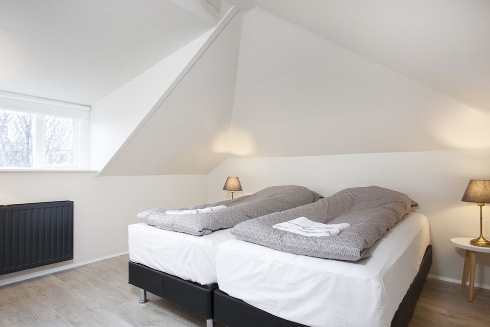 نوروري أبارتمنتس - ريكيافيك - غرفة نوم