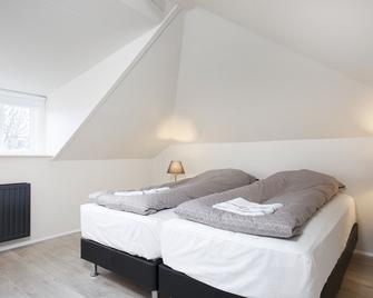 نوروري أبارتمنتس - ريكيافيك - غرفة نوم