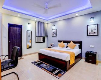 Hotel Maayra Inn - Noida - Schlafzimmer