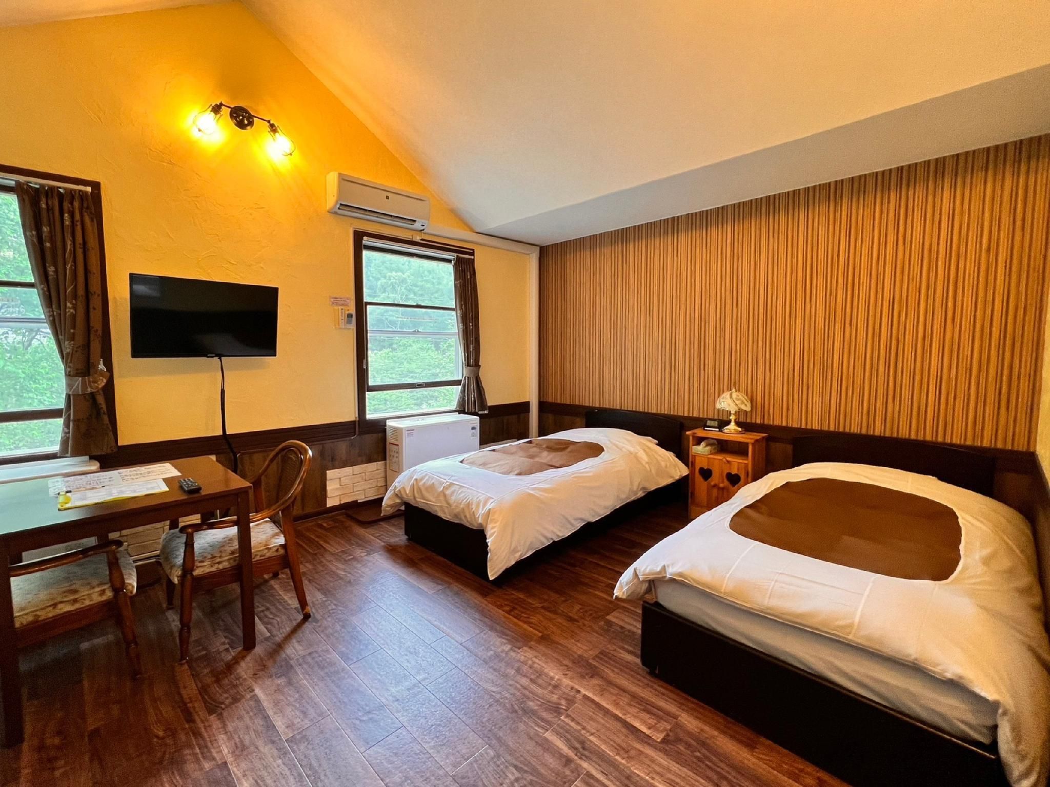 Guest House Bern - Chino - Slaapkamer