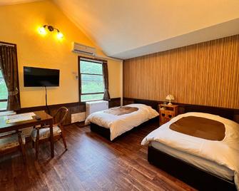 Guest House Bern - Chino - Bedroom