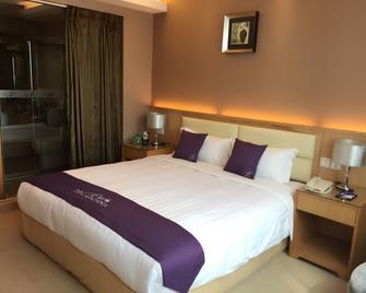 The Bauhinia Hotel - Guangzhou - Soveværelse