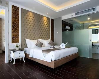 Savero Hotel Depok - Depok - Slaapkamer