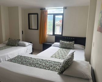 Hotel Los Tunjos - Pereira - Habitación