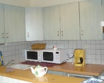 Auvergne town at the center of the volcanoes and on the banks of the Dordogne river - La Bourboule - Køkken