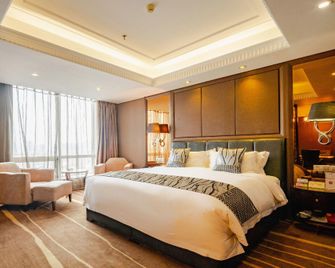Care Feeling Grand Hotel - Deyang - Habitación
