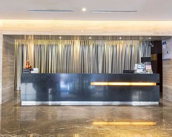 Metropolo Nantong Overseas Chinese Hotel - Nantong - Front desk