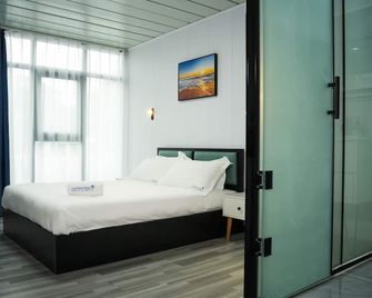 Hotel Laimoa - אפיה - חדר שינה