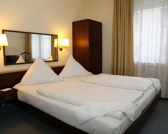 Hotel Löhndorf - בון - חדר שינה