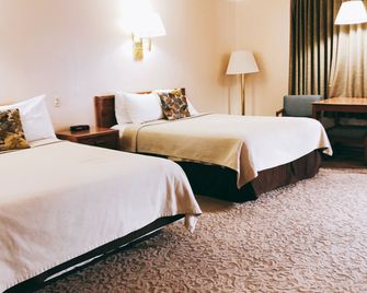 Covered Wagon Motel Lusk Wy - Lusk - Habitación