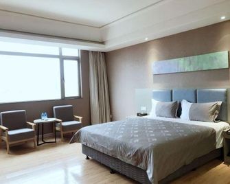 M Hotel (Dongguan Haichao) - Dongguan - Bedroom