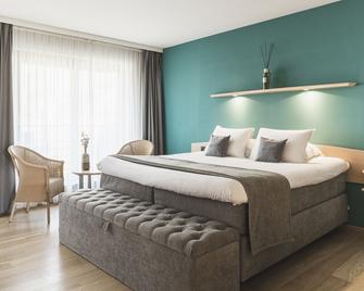 Boutique Hotel 'Hof ter Duinen' - Oostduinkerke - Schlafzimmer