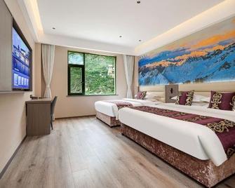 Maoxian International Hotel - Deyang - Slaapkamer