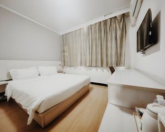 7Days Inn Kaifeng Gulou Square Xueyuanmen - Kai Feng - Camera da letto