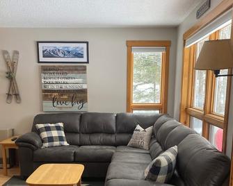 Clean, Comfortable, Ski-in, Ski-out Snowbrook Village Condo - Carrabassett Valley - Living room