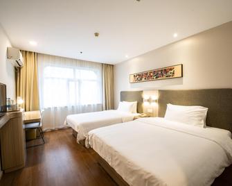 Hanting Hotel Chongqing Guanyinqiao Branch - Chongqing - Bedroom